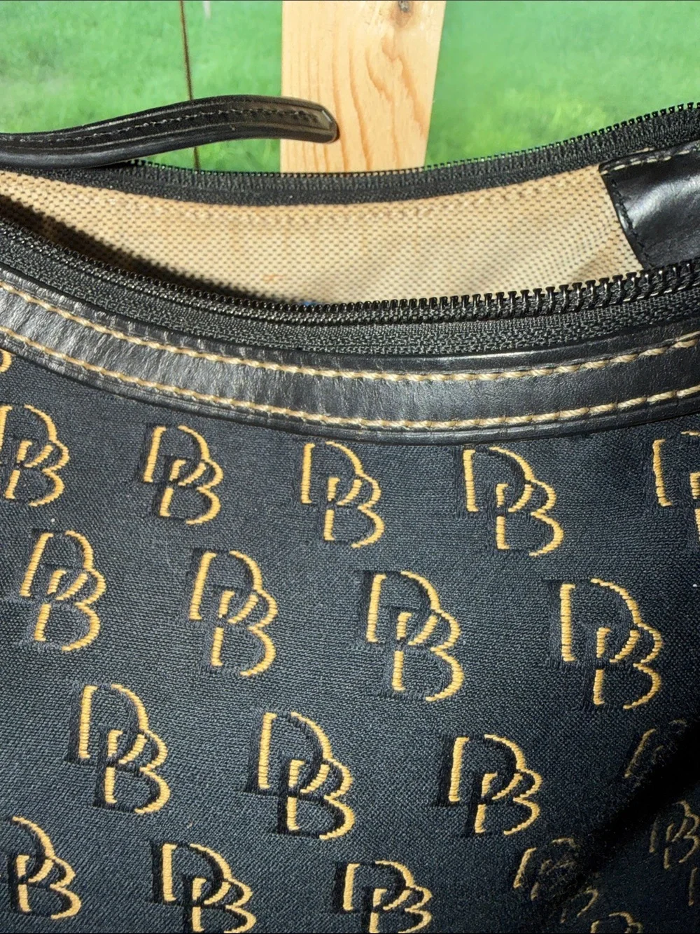 Dooney & Bourke Black with Gold Monogram Hobo Bag